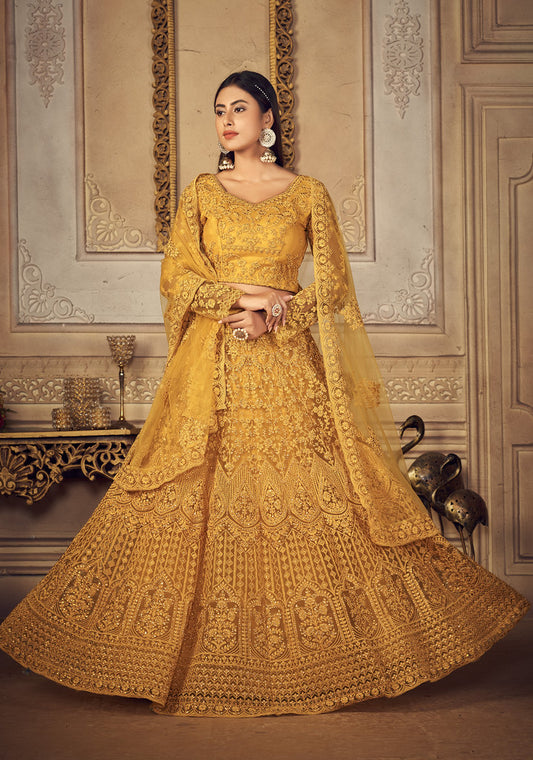 Mustard Net Heavy Thread Embroidery Cordding With Stone Work Lehenga Choli (2 Layer Inner With Can Can)